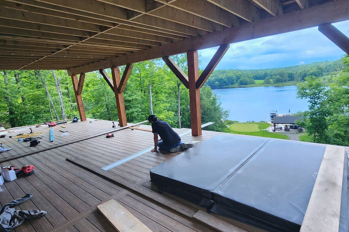 Composite decking installed on a lakeside deck, customer project