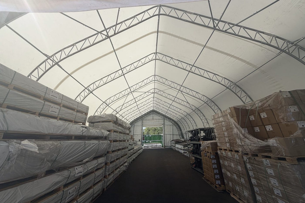 Fabric storage shelter protecting stored equipment, customer project